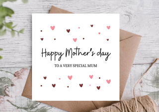 Mother's Day card with hearts and envelope on a textured surface - Pangolins