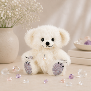 White teddy bear with decorative elements on a soft background - Pangolins