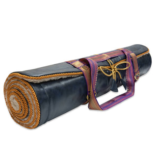 Roll-up navy yoga mat with decorative strap on a white background - Pangolins