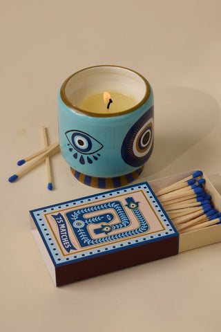 A Dopo Eye ceramic candle