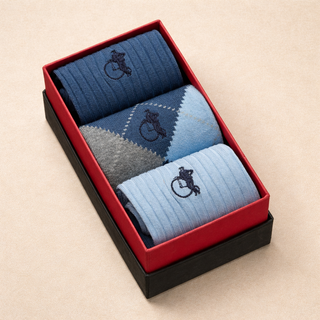 London Sock Company blue argyle sock gift box in presentation box, angled view showing three pairs - Pangolins