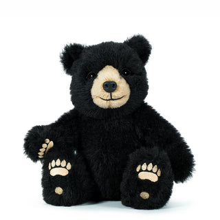 Merrythought Winnipeg black bear teddy bear handcrafted in England with soft black mohair fur and embroidered paw details. 