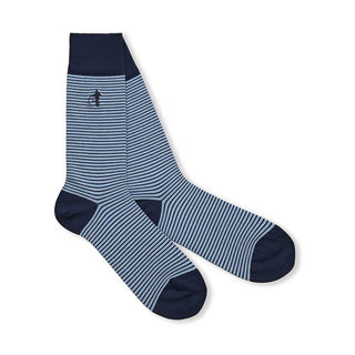 Pair of blue and white striped socks on a white background