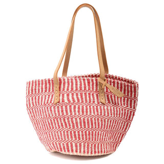 A woven straw tote bag with a red and white striped pattern and natural tan leather handles, shown on a plain white background.