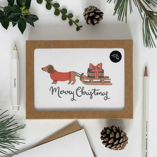 Dachshund pulling a Sledge Merry Christmas Card Pack - Pangolins
