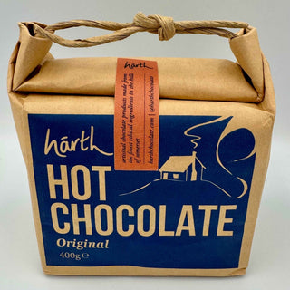 Kraft paper bag with blue label and twine handle Harth Organic Chocolate - Pangolins