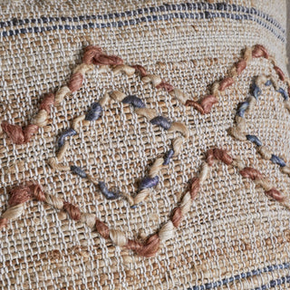 Detailed woven cotton and jute fabric of Nkuku Nila Esha cushion cover